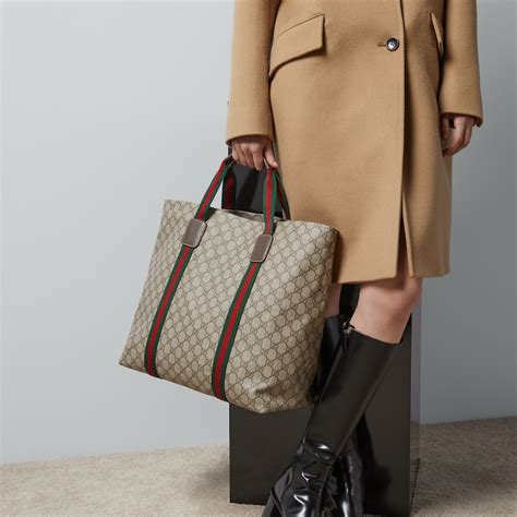 gucci gg tender medium tote bag|Gucci embossed leather tote bag.